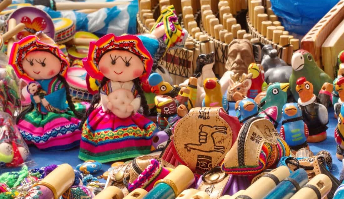 Pick up a souvenir at the market in Otavalo