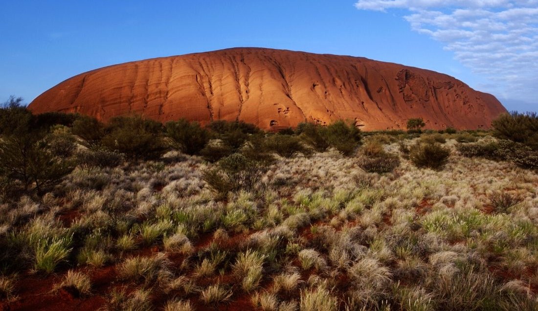 Witness the stunning beauty of Uluru in the heart of the Australian Outback.