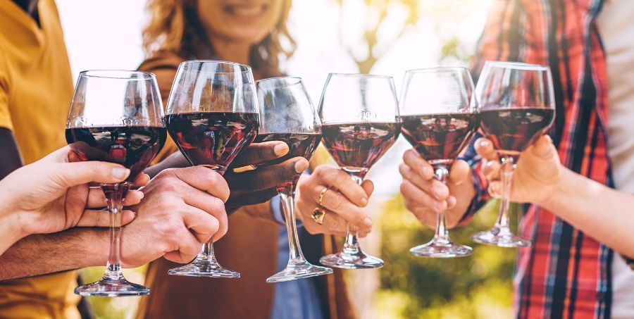 Group-people-holding-red-wine.jpg