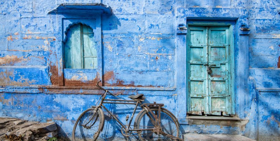 Bicycle resting against a blue wall in Jodhpur’s iconic Blue City.jpg