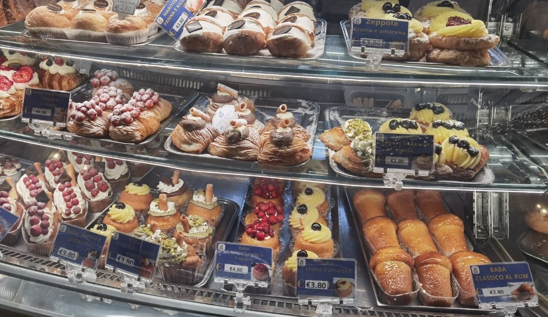 Enjoy a street food tour and indulge in classic Neapolitan pastries.