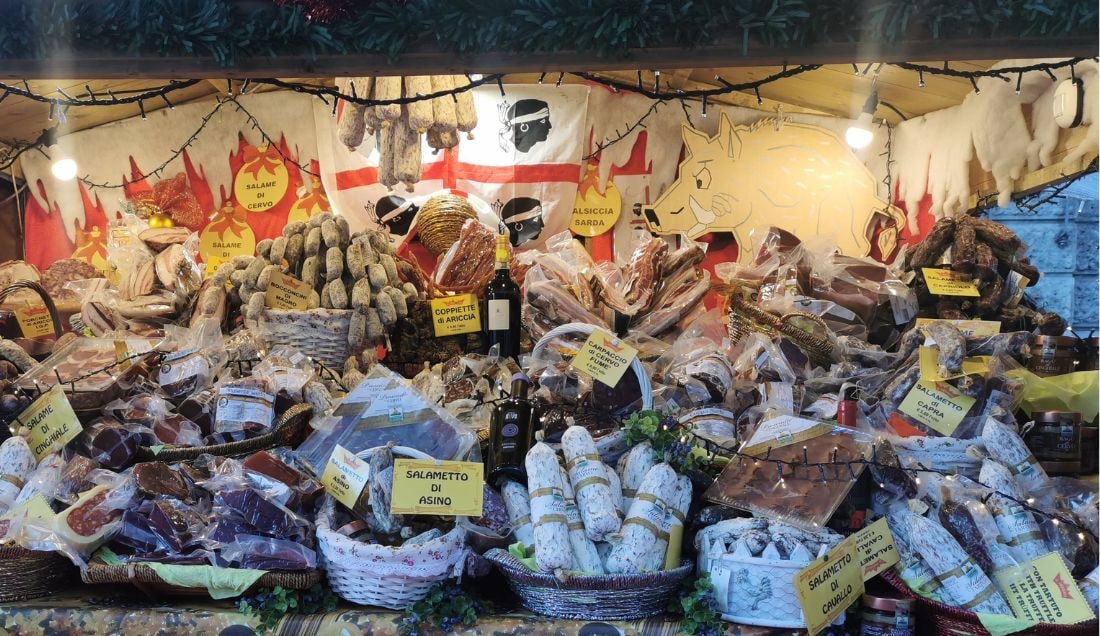 Shop for local delicacies in Lake Como Christmas markets.